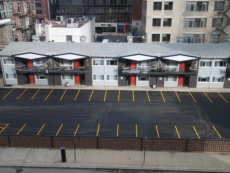 Aerial view of parking lot and motel